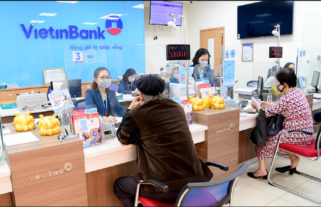 VietinBank và Vietcombank đã có đủ cơ sở pháp lí để chia cổ tức bằng cổ phiếu - Ảnh 1. VietinBank và Vietcombank đã có đủ cơ sở pháp lí để chia cổ tức bằng cổ phiếu - Ảnh 1.