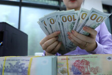 'Khối ngoại có thể mua ròng trở lại khi VND mạnh lên trong năm 2021'