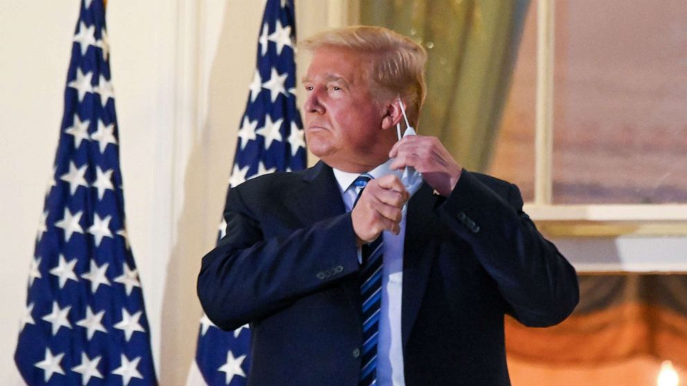 Ông Trump làm gì khi Mỹ ghi nhận 1,2 triệu ca COVID-19 trong một tuần? - Ảnh 3.