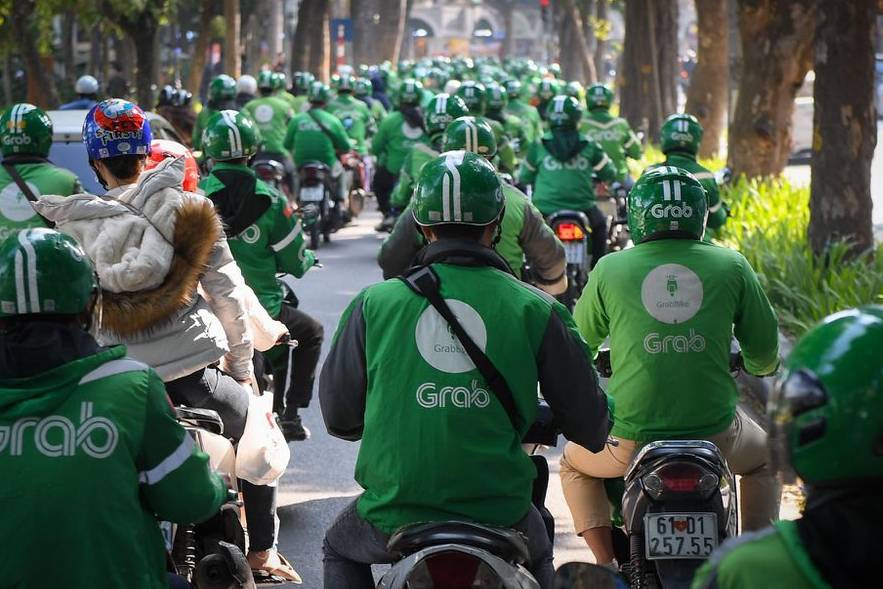 Grab quan ngại trước cách giải thích của Tổng cục Thuế - Ảnh 1. Grab quan ngại trước cách giải thích của Tổng cục Thuế - Ảnh 1.