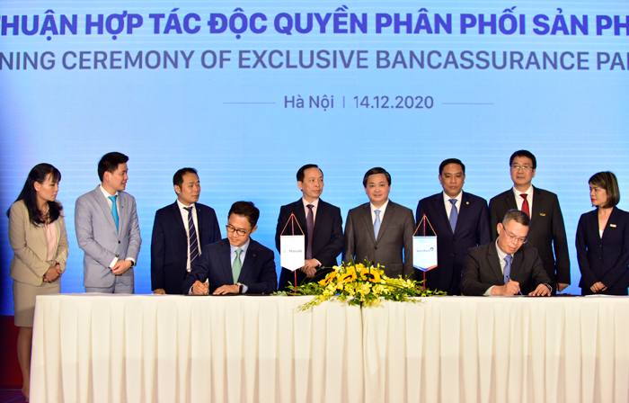 VietinBank ký kết thỏa thuận phân phối bảo hiểm độc quyền với Manulife  - Ảnh 1.