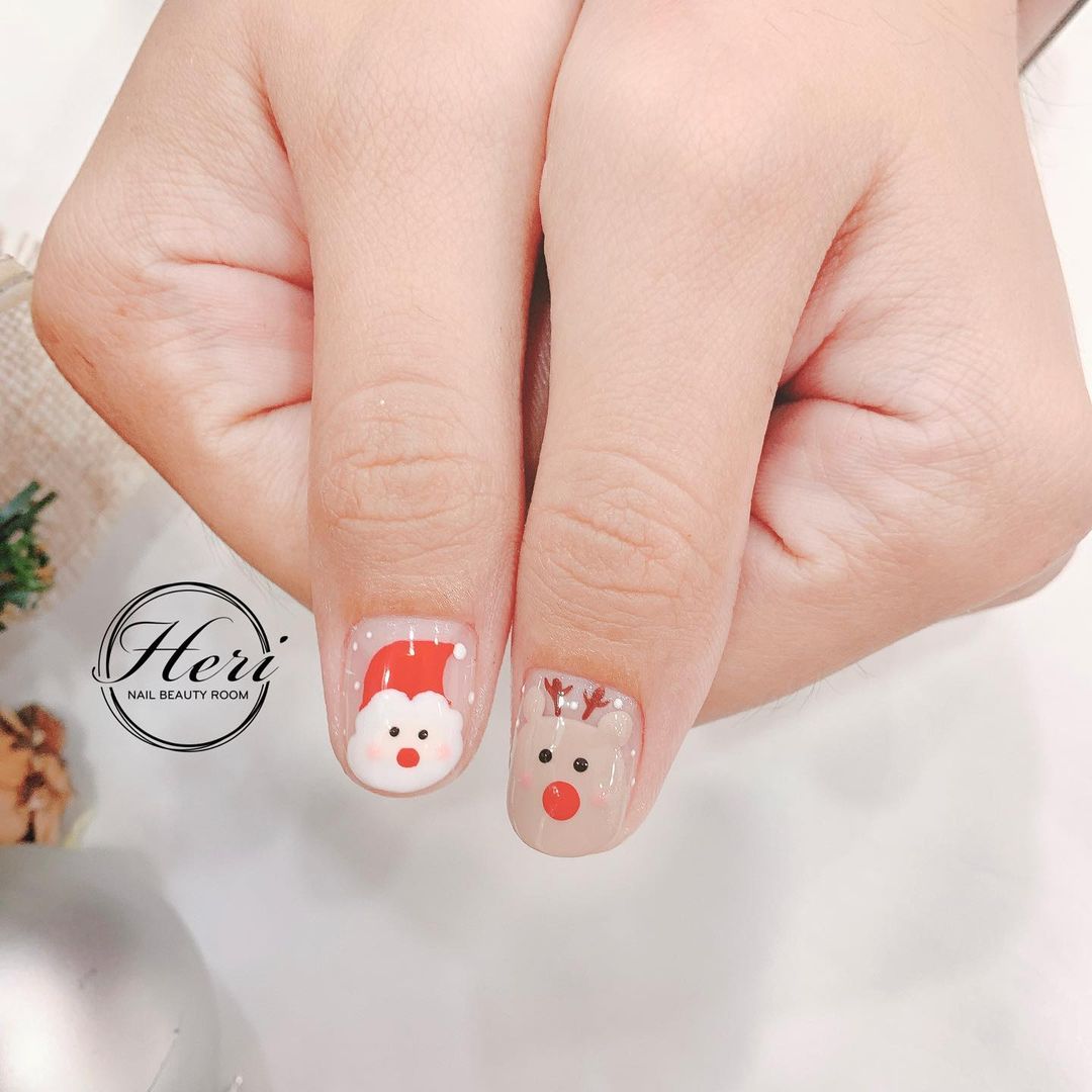 Hưởng ứng Noel bằng những mẫu nail có họa tiết nổi bật và độc đáo - Ảnh 16. Hưởng ứng Noel bằng những mẫu nail có họa tiết nổi bật và độc đáo - Ảnh 16.