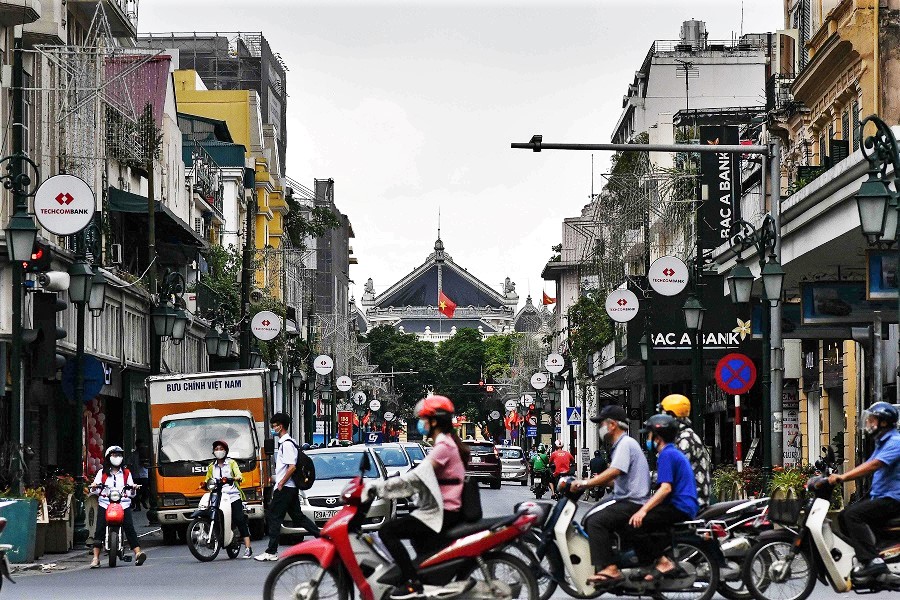 World Bank: Hai bài học lớn từ xử lý tốt COVID-19 giúp Việt Nam tiến gần mục tiêu nền kinh tế thu nhập cao - Ảnh 1. World Bank: Hai bài học lớn từ xử lý tốt COVID-19 giúp Việt Nam tiến gần mục tiêu nền kinh tế thu nhập cao - Ảnh 1.