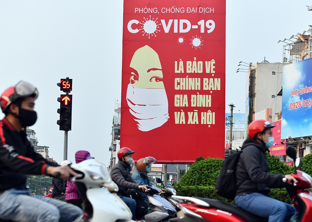 World Bank: Hai bài học lớn từ xử lý tốt COVID-19 giúp Việt Nam tiến gần mục tiêu nền kinh tế thu nhập cao - Ảnh 2. World Bank: Hai bài học lớn từ xử lý tốt COVID-19 giúp Việt Nam tiến gần mục tiêu nền kinh tế thu nhập cao - Ảnh 2.