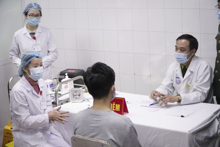 Việt Nam tiếp tục tiêm thử nghiệm vắc xin COVID-19 cho 17 tình nguyện viên - Ảnh 1. Việt Nam tiếp tục tiêm thử nghiệm vắc xin COVID-19 cho 17 tình nguyện viên - Ảnh 1.
