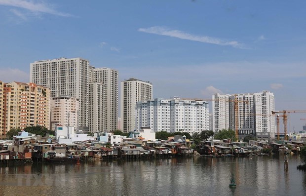 Xu hướng phát triển thị trường bất động sản TP.HCM năm 2021 - Ảnh 1.