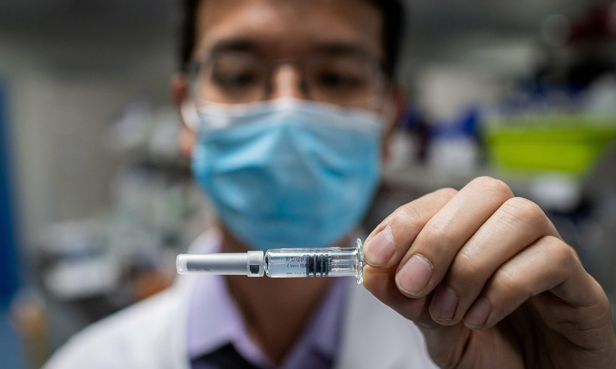 Trung Quốc phê duyệt vắc xin COVID-19 đầu tiên để sử dụng đại trà - Ảnh 1. Trung Quốc phê duyệt vắc xin COVID-19 đầu tiên để sử dụng đại trà - Ảnh 1.