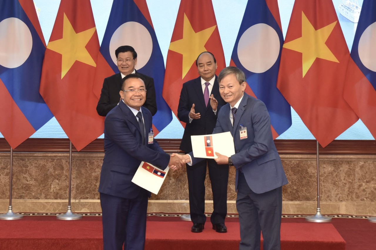 EVN kí loạt hợp đồng mua điện từ các Tập đoàn của Lào - Ảnh 1. EVN kí loạt hợp đồng mua điện từ các Tập đoàn của Lào - Ảnh 1.