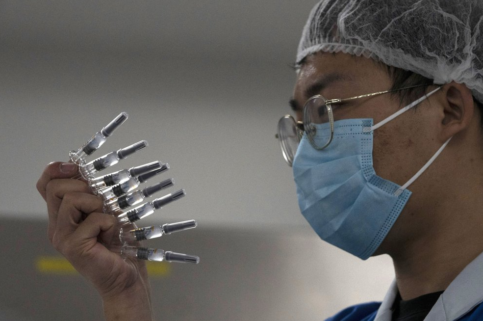 Trung Quốc chuẩn bị triển khai vắc xin COVID-19 trên qui mô lớn - Ảnh 1. Trung Quốc chuẩn bị triển khai vắc xin COVID-19 trên qui mô lớn - Ảnh 1.