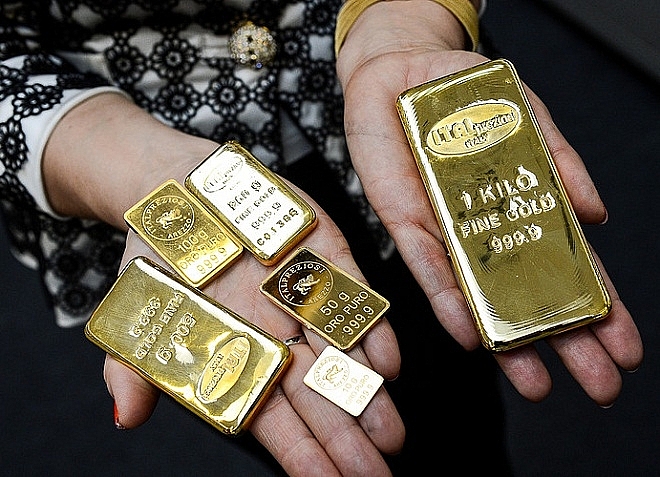 Giá vàng hôm nay 18/4: Áp lực chốt lời tăng cao, vàng tụt ngưỡng 1.700 USD/ounce. - Ảnh 2. Giá vàng hôm nay 18/4: Áp lực chốt lời tăng cao, vàng tụt ngưỡng 1.700 USD/ounce. - Ảnh 2.