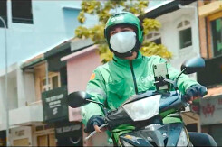 Grab dẫn đầu thị trường giao thức ăn, dù tăng thêm phí giao hàng giữa mùa dịch Covid-19