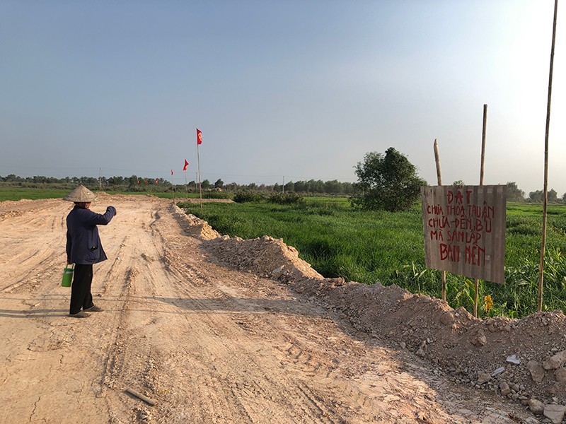 Chưa bồi thường, chủ đầu tư đã san lấp đất của dân - Ảnh 1. Chưa bồi thường, chủ đầu tư đã san lấp đất của dân - Ảnh 1.