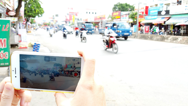CSGT có thể xử lí vi phạm từ thông tin hình ảnh đăng tải trên Facebook - Ảnh 1.