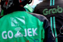 Grab và Gojek sẽ có lãi nhờ ví điện tử