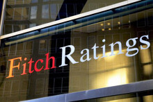 Fitch hạ đánh giá triển vọng kinh tế Mỹ xuống 'tiêu cực'