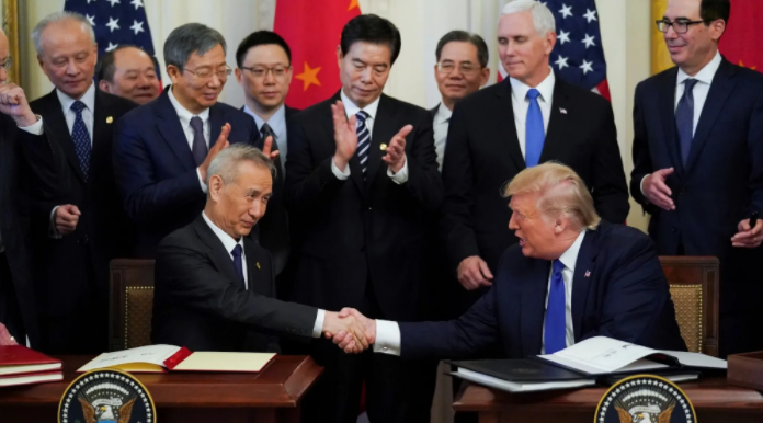 Lí do Mỹ và Trung Quốc muốn níu giữ thỏa thuận thương mại - Ảnh 1.