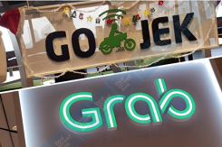 Chuyện hợp nhất giữa Grab và Gojek là tin đồn