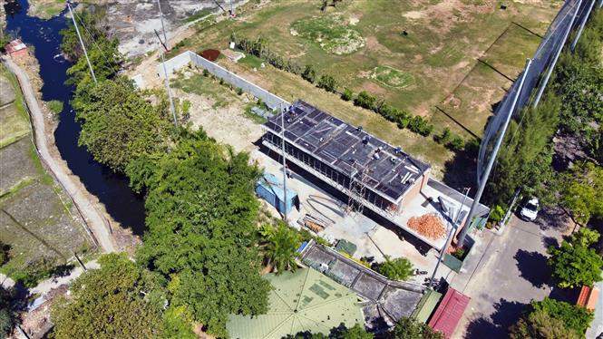 Căn nhà (diện tích 210m2) đối diện số B11/11 Khu trung tâm Chí Linh xây dựng trái phép. (Ảnh: TTXVN) Căn nhà (diện tích 210m2) đối diện số B11/11 Khu trung tâm Chí Linh xây dựng trái phép. (Ảnh: TTXVN)