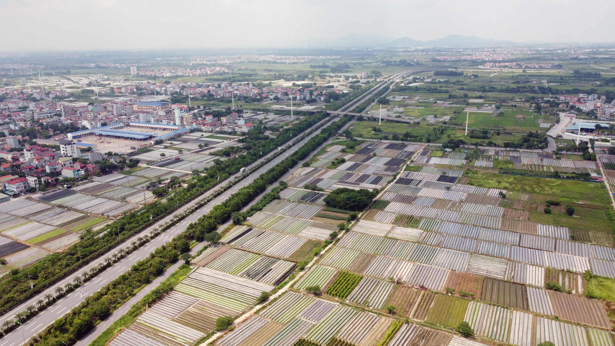 Huyện Đông Anh sắp thu hồi gần 500 ha đất làm công viên phần mềm, loạt khu đô thị mới, tổ hợp y tế của TH,... - Ảnh 1. Huyện Đông Anh sắp thu hồi gần 500 ha đất làm công viên phần mềm, loạt khu đô thị mới, tổ hợp y tế của TH,... - Ảnh 1.