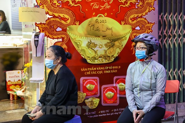 'Phố vàng' ở Thủ đô kém sắc hơn mọi năm trong ngày vía Thần Tài 2021 - Ảnh 10. 'Phố vàng' ở Thủ đô kém sắc hơn mọi năm trong ngày vía Thần Tài 2021 - Ảnh 10.
