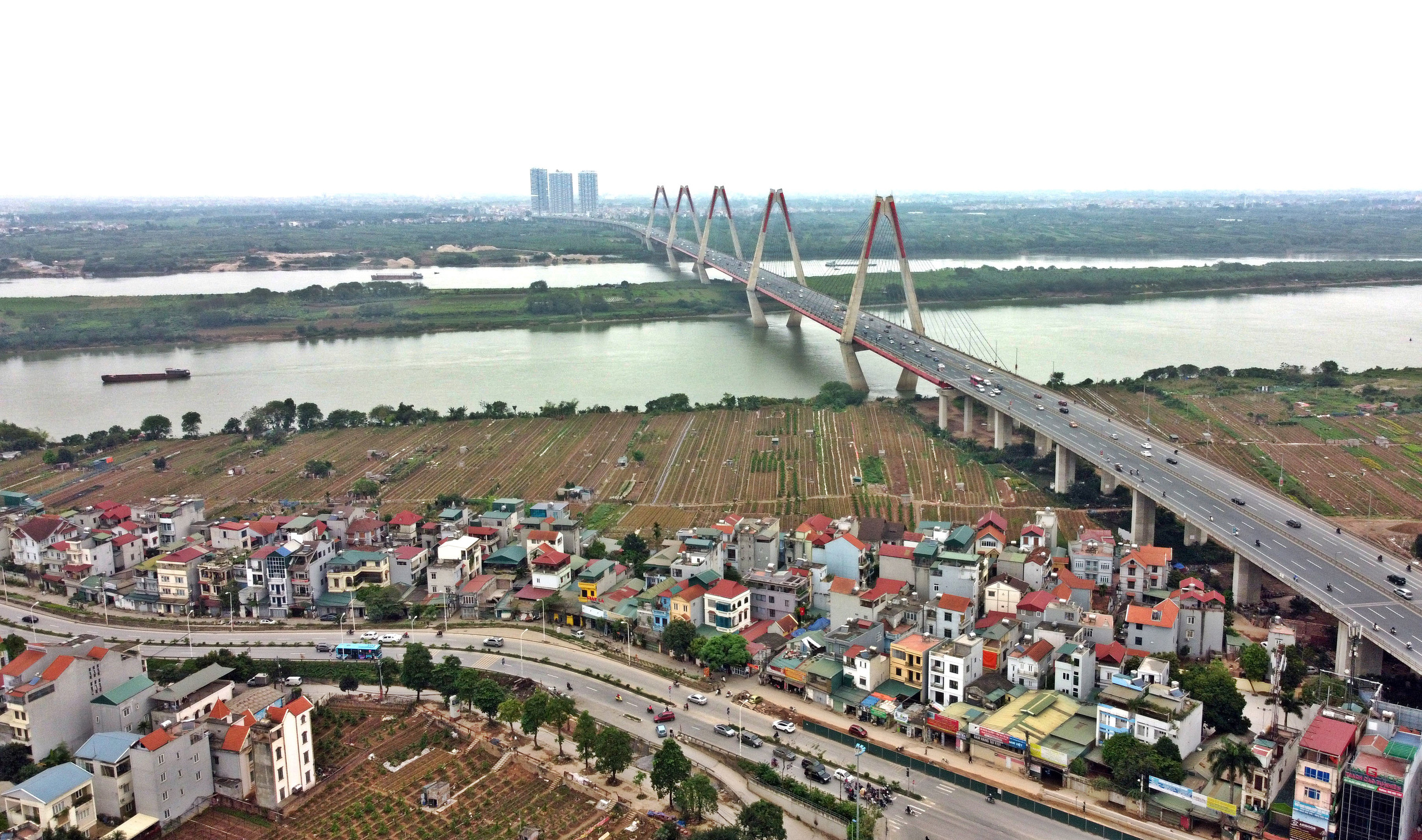 Phân khu đô thị sông Hồng chưa duyệt, nhà ở riêng lẻ ngoài đê có thể được cấp phép xây dựng - Ảnh 1. Phân khu đô thị sông Hồng chưa duyệt, nhà ở riêng lẻ ngoài đê có thể được cấp phép xây dựng - Ảnh 1.