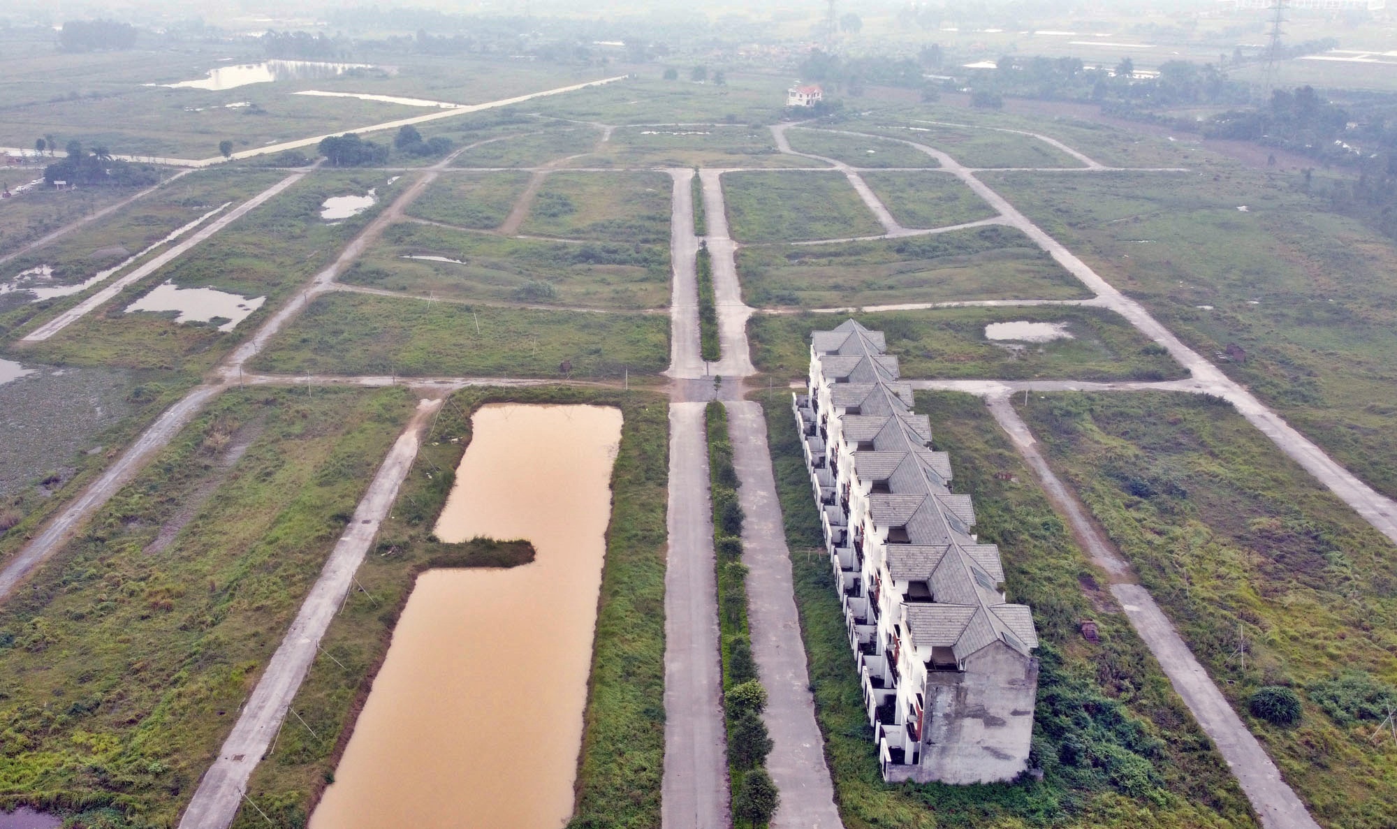 Loạt dự án chậm triển khai ở huyện Mê Linh có thể bị thu hồi, giao chủ đầu tư khác - Ảnh 1. Loạt dự án chậm triển khai ở huyện Mê Linh có thể bị thu hồi, giao chủ đầu tư khác - Ảnh 1.