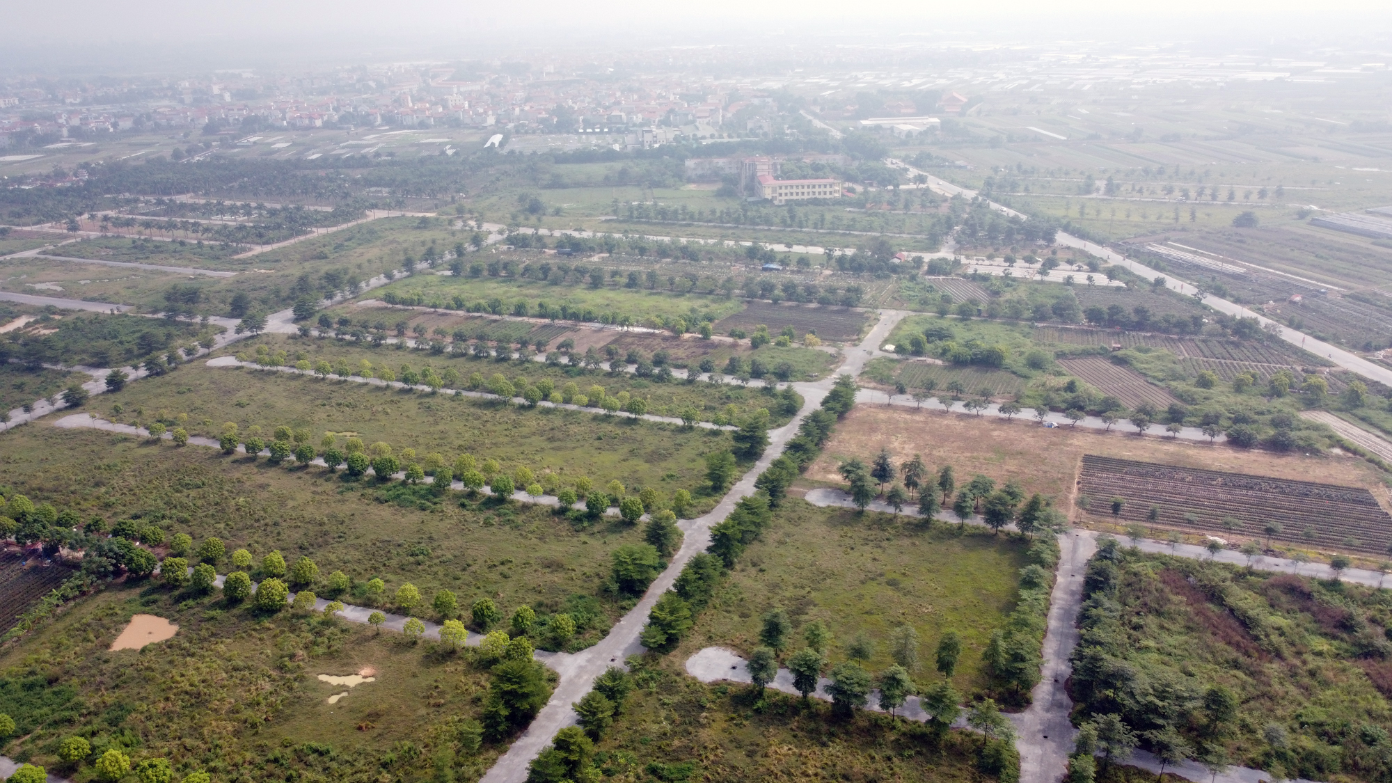 Đẩy nhanh tiến độ xây dựng khu đô thị mới AIC Mê Linh sau hơn một thập kỷ 'ì ạch' - Ảnh 1.