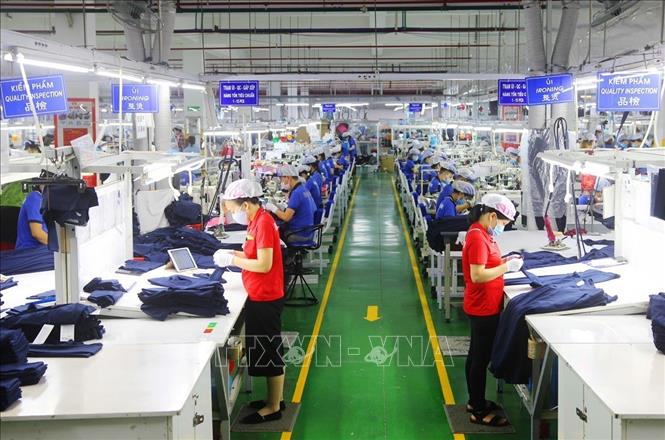 Sôi động sản xuất đầu năm của các doanh nghiệp vùng đất công nghiệp Bình Dương - Ảnh 1.