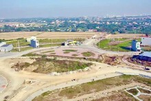Có áp dụng hai Luật Đất đai trong một dự án?