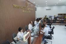 Ra mắt sổ tay hướng dẫn thủ tục đất đai cho chính quyền hai cấp