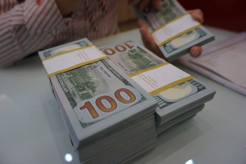 Tại sao Việt Nam không phá giá tiền đồng? - Ảnh 1. Tại sao Việt Nam không phá giá tiền đồng? - Ảnh 1.