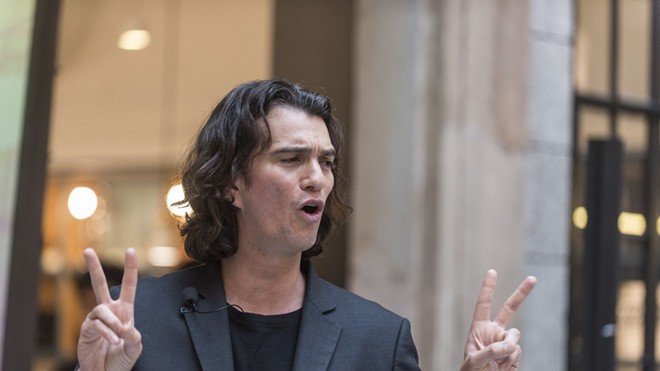 Tập đoàn Nhật chấp nhận chi 200 triệu USD để tống cổ cựu CEO WeWork - Ảnh 1. Tập đoàn Nhật chấp nhận chi 200 triệu USD để tống cổ cựu CEO WeWork - Ảnh 1.