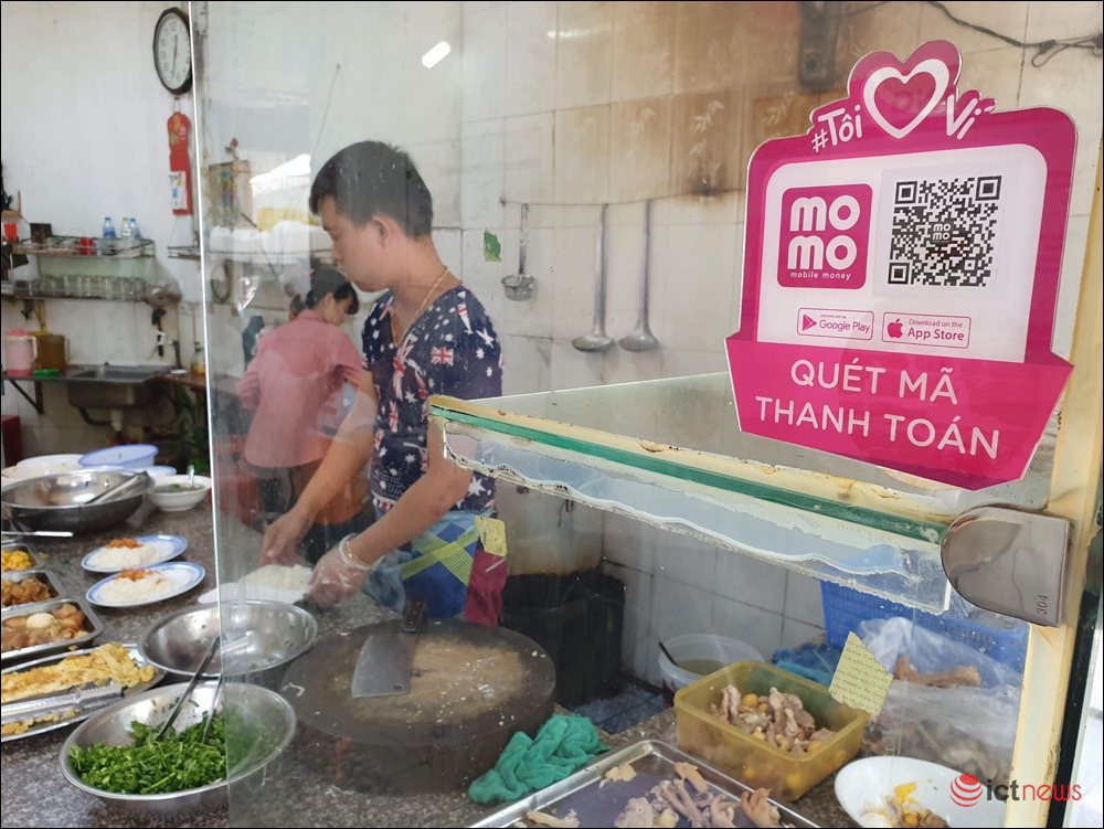 Ví điện tử len lỏi đến từng ngóc ngách của thành phố - Ảnh 1. Ví điện tử len lỏi đến từng ngóc ngách của thành phố - Ảnh 1.