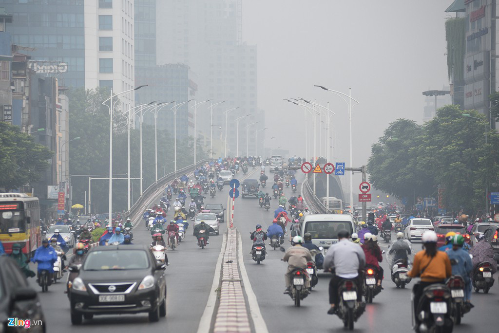 Người Hà Nội đi làm dưới mưa phùn - Ảnh 5. Người Hà Nội đi làm dưới mưa phùn - Ảnh 5.