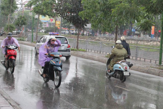 Cuối tuần miền Bắc mưa rét - Ảnh 1. Cuối tuần miền Bắc mưa rét - Ảnh 1.