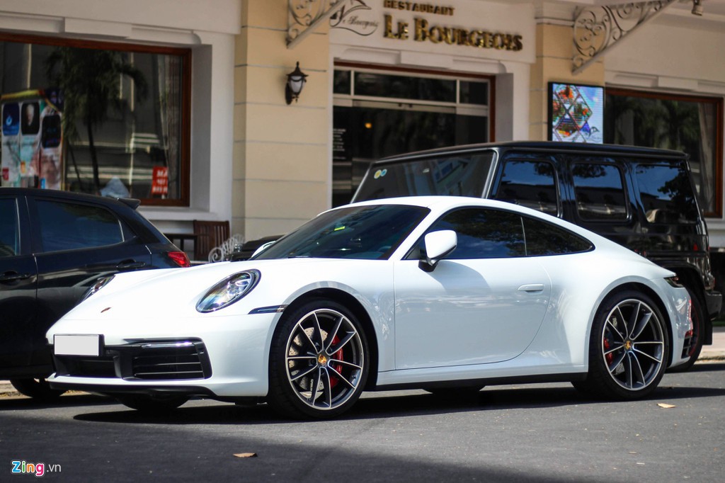 Vợ chồng Cường Đô La tậu Porsche 911 Carrera S giá gần 8 tỉ đồng - Ảnh 1. Vợ chồng Cường Đô La tậu Porsche 911 Carrera S giá gần 8 tỉ đồng - Ảnh 1.