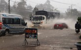 Quốc lộ 20 biến thành 'sông' sau trận mưa lớn kéo dài