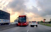 Xe khách lao vun vút trên làn đường ngược chiều của quốc lộ 1A
