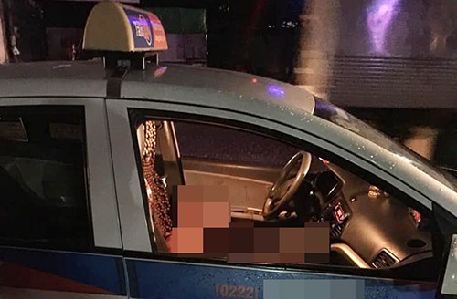 Nữ tài xế nhiều vết thương kêu cứu trong taxi - Ảnh 1.