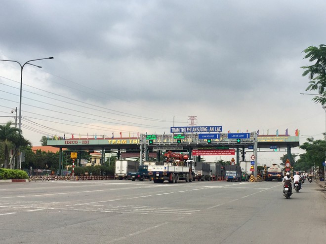 TP HCM: Thu phí tự động đường bộ, người có ô tô phải làm gì? - Ảnh 1. TP HCM: Thu phí tự động đường bộ, người có ô tô phải làm gì? - Ảnh 1.
