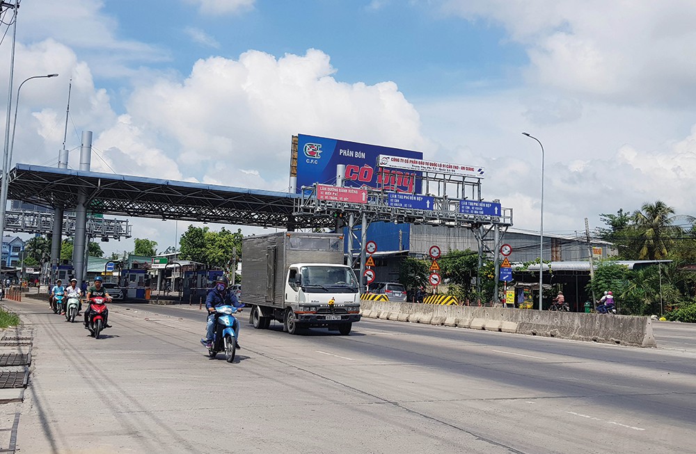 BOT T2 ở Cần Thơ liên tục xả trạm: Cầu Vàm Cống trị giá 5.700 tỉ miễn phí, nâng cấp QL91 lại thu phí  - Ảnh 1.