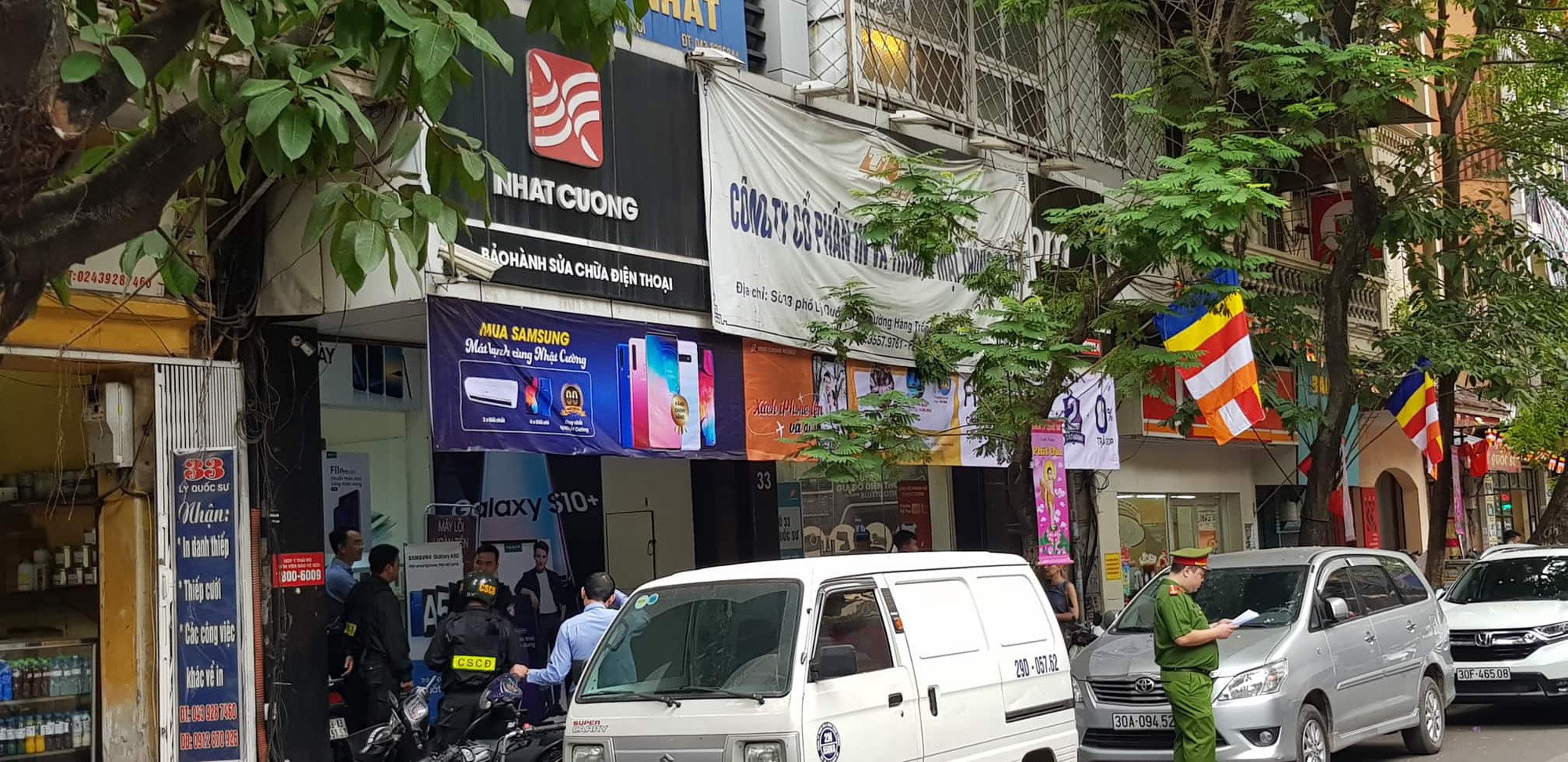 Bộ Công an khám xét chuỗi cửa hàng điện thoại Nhật Cường Mobile - Ảnh 7.