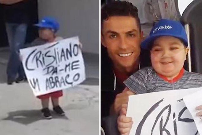 Ronaldo dừng xe buýt để đáp lại tình cảm CĐV nhí - Ảnh 1. Ronaldo dừng xe buýt để đáp lại tình cảm CĐV nhí - Ảnh 1.