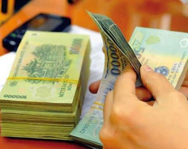Lương tối thiểu vùng hiện nay mới đáp ứng 95% nhu cầu sống tối thiểu - Ảnh 1.