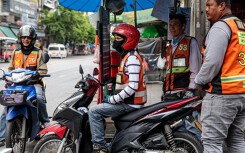 Xe ôm truyền thống và xe ôm Grab tử chiến tại Bangkok