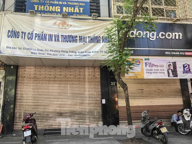 Chuỗi cửa hàng Nhật Cường 'phủ bạt, che biển' sau hơn một tháng ông chủ bỏ trốn - Ảnh 3. Chuỗi cửa hàng Nhật Cường 'phủ bạt, che biển' sau hơn một tháng ông chủ bỏ trốn - Ảnh 3.