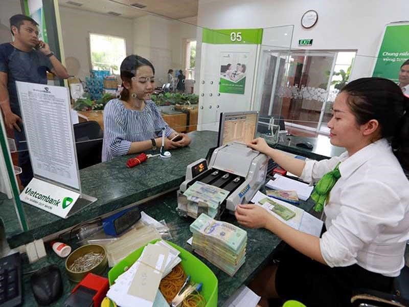 Phía sau lợi nhuận khủng của các ngân hàng - Ảnh 1. Phía sau lợi nhuận khủng của các ngân hàng - Ảnh 1.