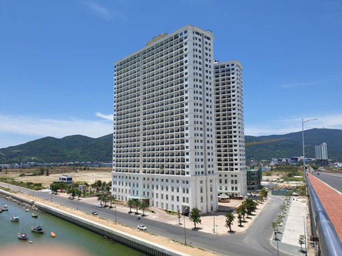 Tung chiêu cam kết sổ đỏ để bán condotel - Ảnh 1.