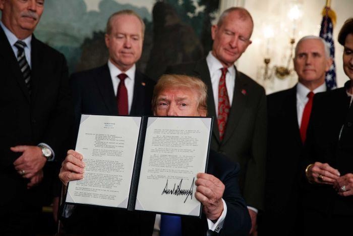Chiến tranh thương mại giờ là đối đầu trực diện giữa 2 ông Trump - Tập - Ảnh 1.