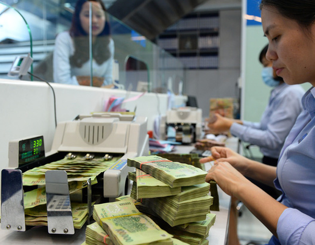 Ngân hàng Nhà nước giảm lãi suất đồng loạt chưa phải là nới lỏng tiền tệ - Ảnh 1. Ngân hàng Nhà nước giảm lãi suất đồng loạt chưa phải là nới lỏng tiền tệ - Ảnh 1.